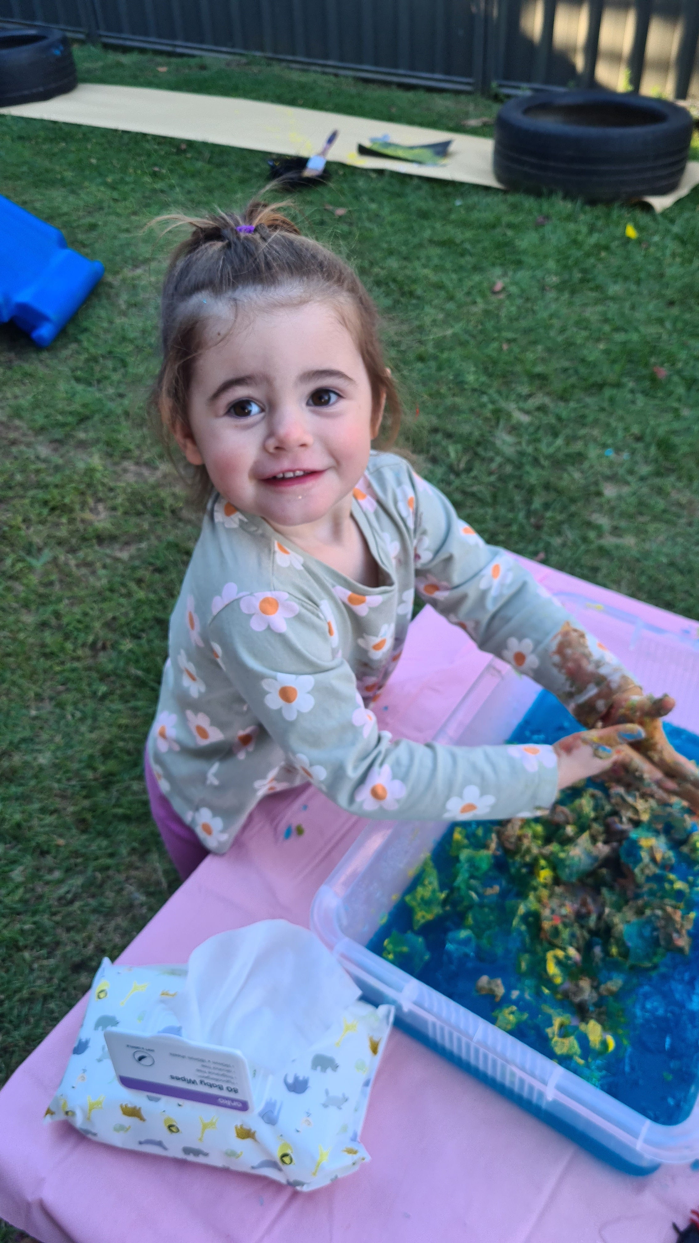 Happy child playing with jelly